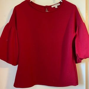 Red blouse with puffy sleeves